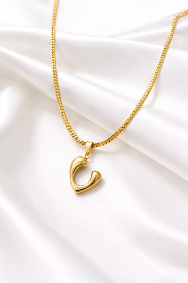 HALF HEART NECKLACE