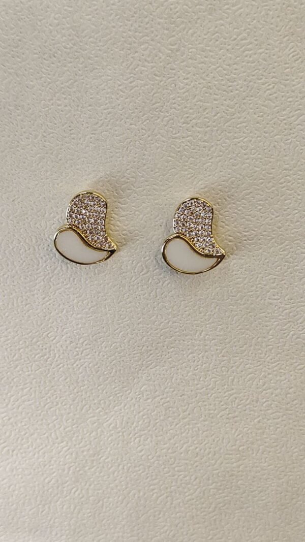 WhatsApp Image 2025-07-08 at 13.47.30 (2) Gold Abstract Wave Stud Earrings with Crystal Embellishment
