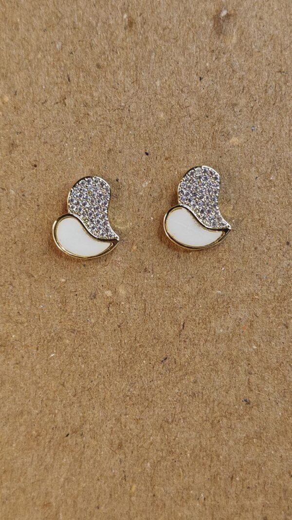 WhatsApp Image 2025-07-08 at 13.47.31 (1) Gold Abstract Wave Stud Earrings with Crystal Embellishment