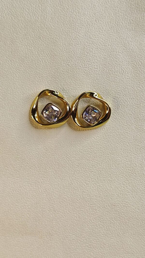WhatsApp Image 2025-07-08 at 13.48.00 (2) Gold Modern Swirl Earrings with Crystal Center
