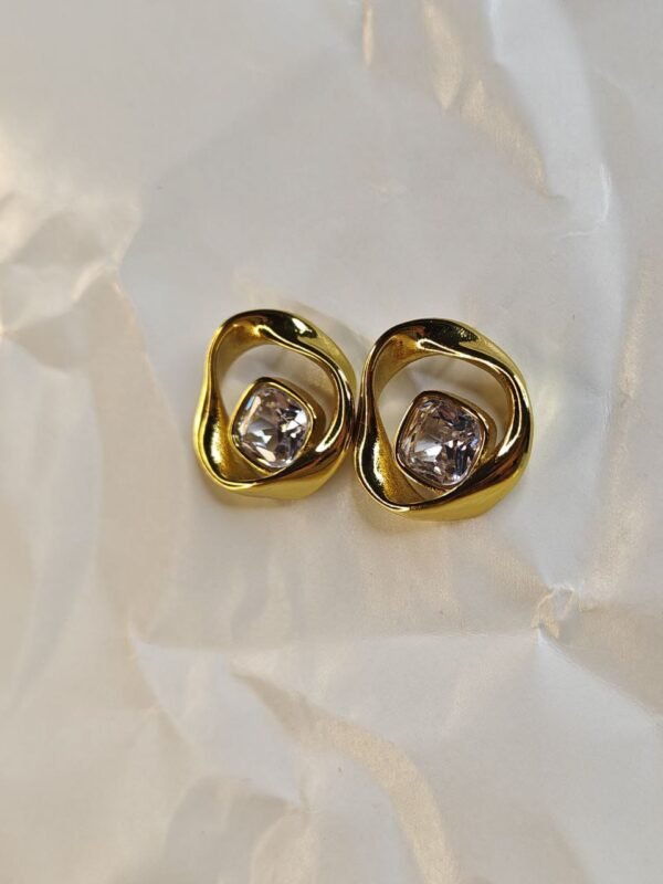 WhatsApp Image 2025-07-08 at 13.48.00 Gold Modern Swirl Earrings with Crystal Center