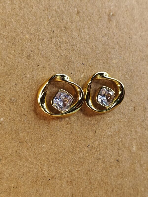 WhatsApp Image 2025-07-08 at 13.48.01 Gold Modern Swirl Earrings with Crystal Center