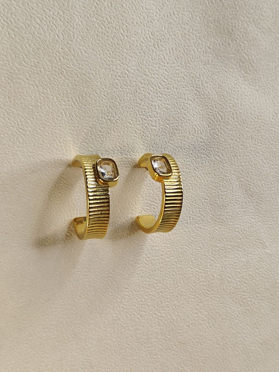 WhatsApp Image 2025-07-08 at 17.09.57 Gold Textured Hoop Earrings with Crystal Accent