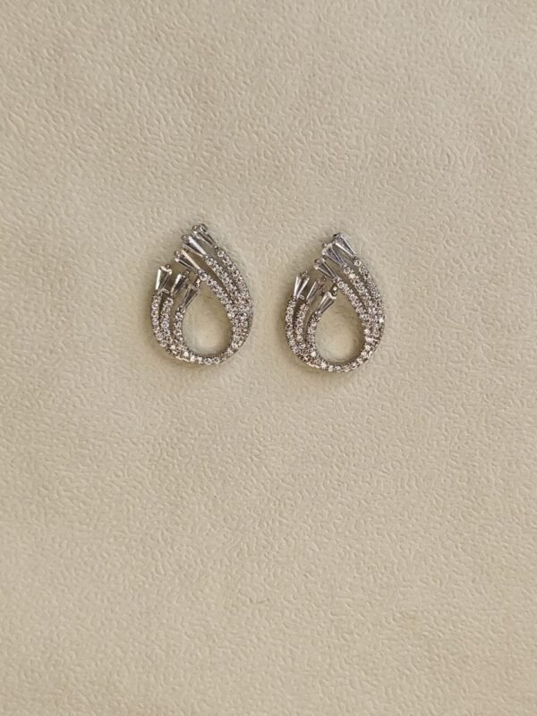 WhatsApp Image 2025-07-08 at 19.11.44 Elegant Cascade Diamond-Cut Studs